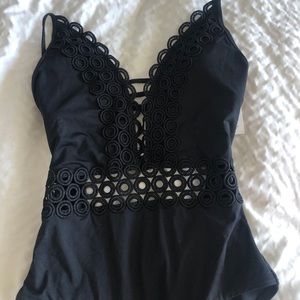 Never worn black cut out one piece